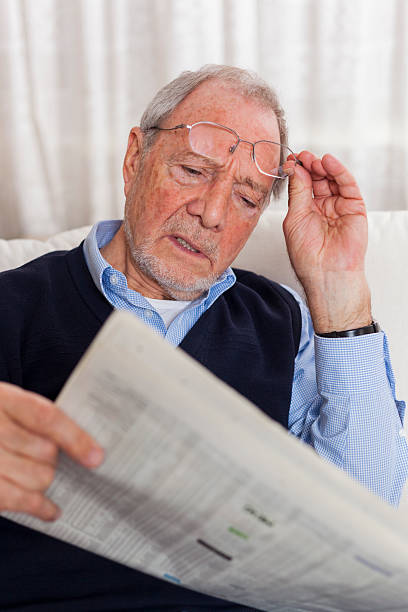 istock older senior man at home reading enjoying retirement 505663626