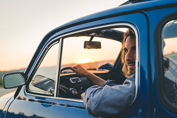 Young Couple Trip With Vintage Car