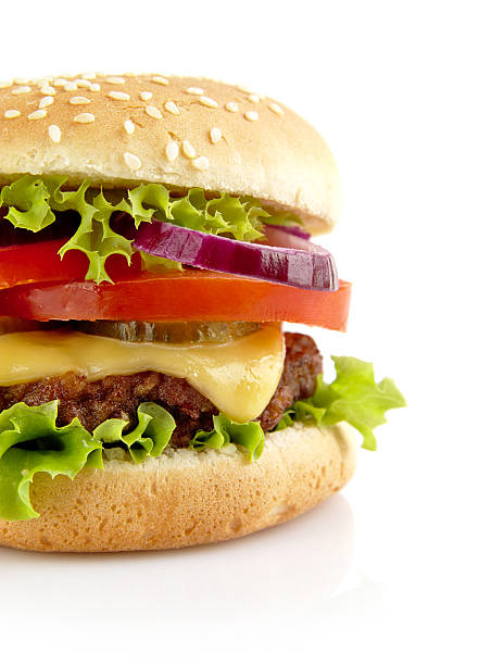 istock Cut shot of big cheeseburger isolated on white background 505667140