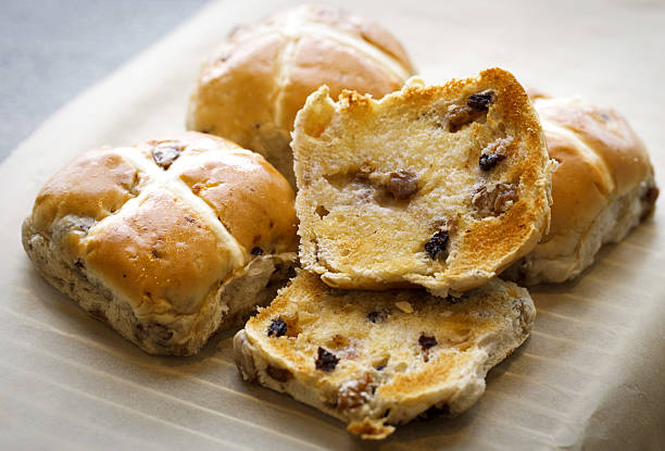 Freshly baked hot cross buns isolated on a white background. Traditional easter food, horizontal