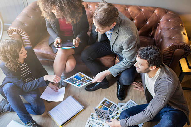 istock Relaxed creative people brainstorming in the office 505669510