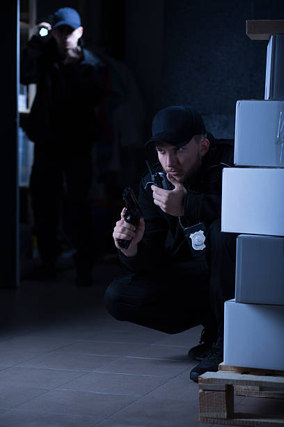 istock Two police officers during action 505673762