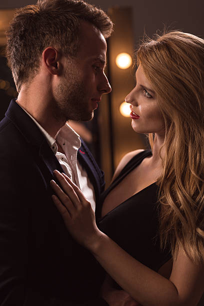 istock Attractive woman seducing handsome man 505674184
