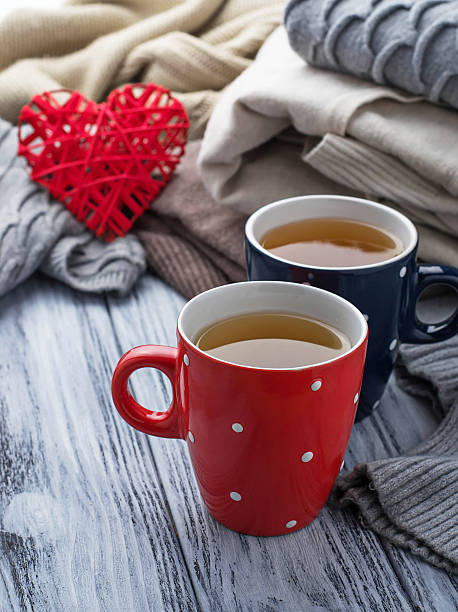 istock Warm knitted pastel clothes and cups 505674426