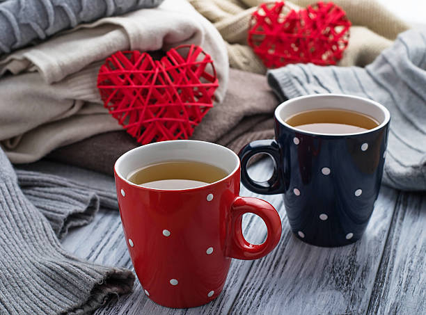 istock Warm knitted pastel clothes and cups 505674484