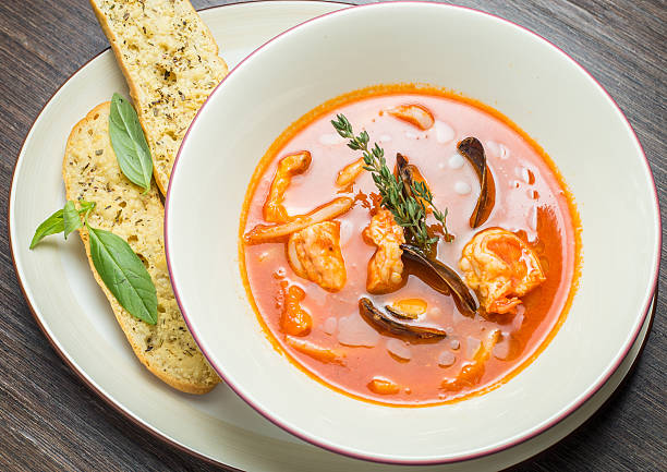 istock Fish soup with tomatoes and mussels 505682528