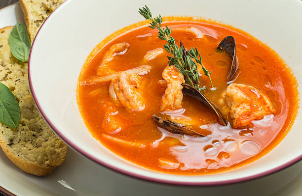 istock Fish soup with tomatoes and mussels 505682620