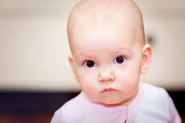 istock Close-up of a small child who cries but does 505682984