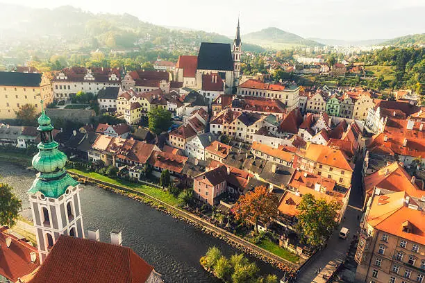 Aerial view on Historic Centre of Český Krumlov at sunrise, situated on the banks of the Vltava river. Czech Republic. UNESCO world heritage site.