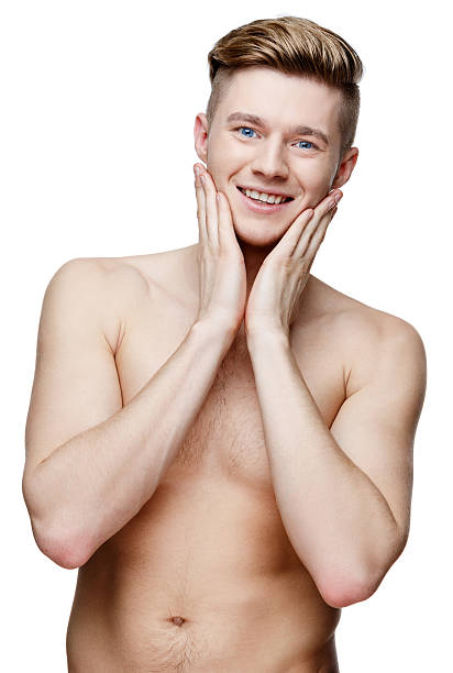 istock Young shirtless man isolated on white 505683356