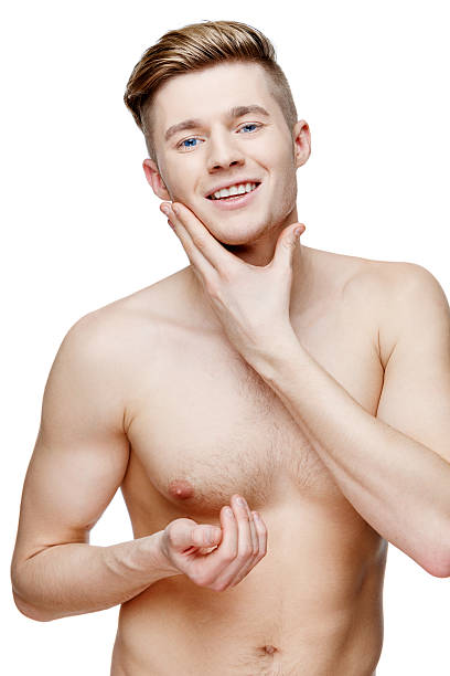 istock Young shirtless man isolated on white 505683672