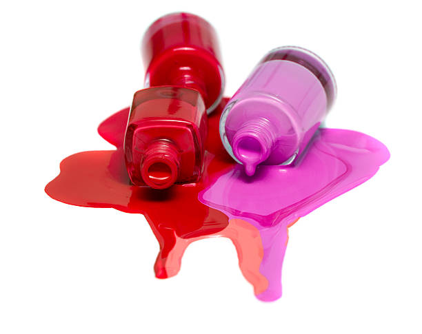 istock 4 color nail Polish on white background 505683694