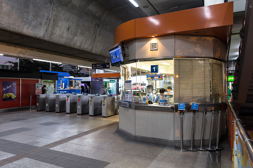 Bangkok, Thailand - January 18, 2016 : Ticket office at the BTS Mo Chit station at the evening with no people buying a ticket at the office but still have the officer inside the office. Daily passengers of BTS skytrain is around 700,000.