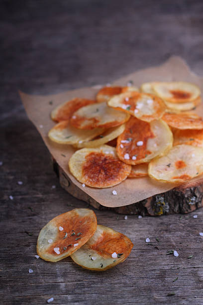 istock homemade potato chips with sea salt 505685744