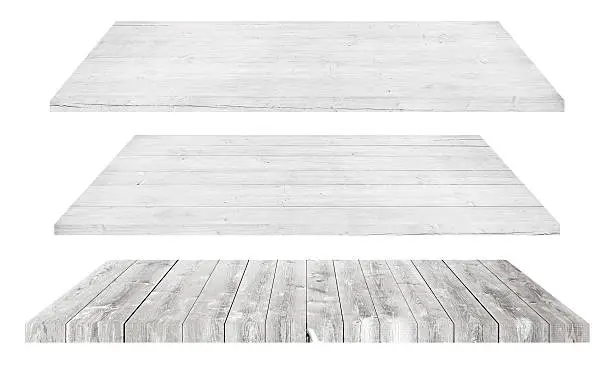White wooden shelves or tabletop isolated on white.