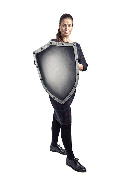 istock Woman protecting herself with a shield 505686804