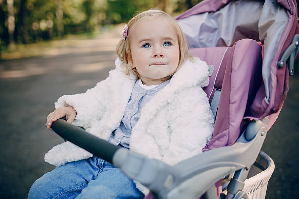 istock young family walking in the park 505690302