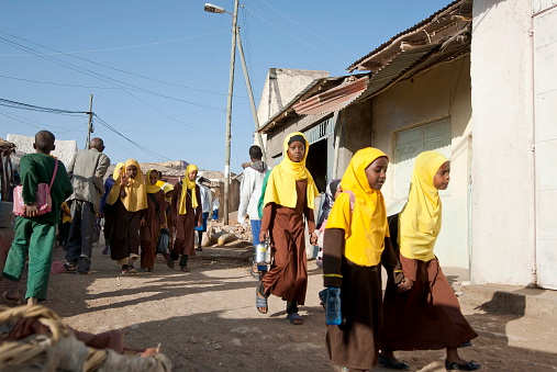 Harar, Ethiopia - March 28th, 2012: Unidentified Ethiopian girls walk to madrasa (Islamic school or college) in Harar, Ethiopia on March 28, 2012. 