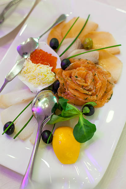 istock fish filet, boiled potatoes, carrots 505691116