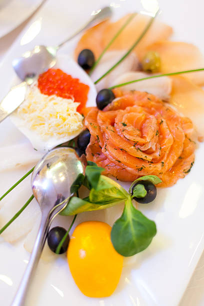 istock fish filet, boiled potatoes, carrots 505691196