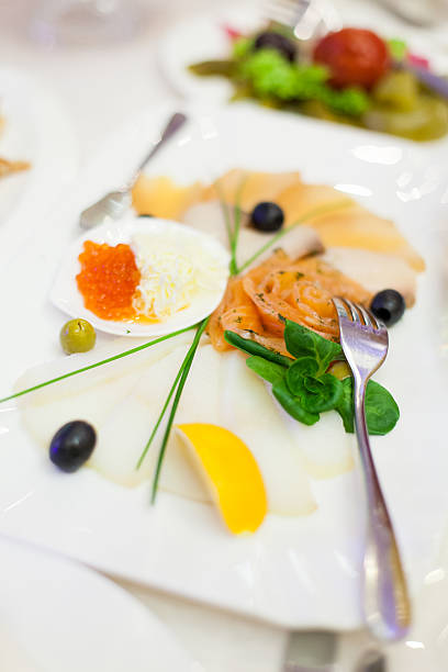 istock fish filet, boiled potatoes, carrots 505691490