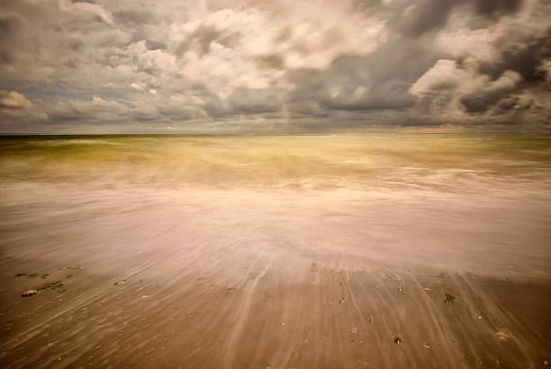istock seascape on cloudy summer day - long exposure image 505691612