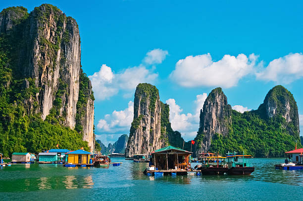 Floating fishing village in Halong Bay Floating fishing village in Halong Bay, Vietnam, Southeast Asia. UNESCO World Heritage Site. gulf of tonkin photos stock pictures, royalty-free photos & images