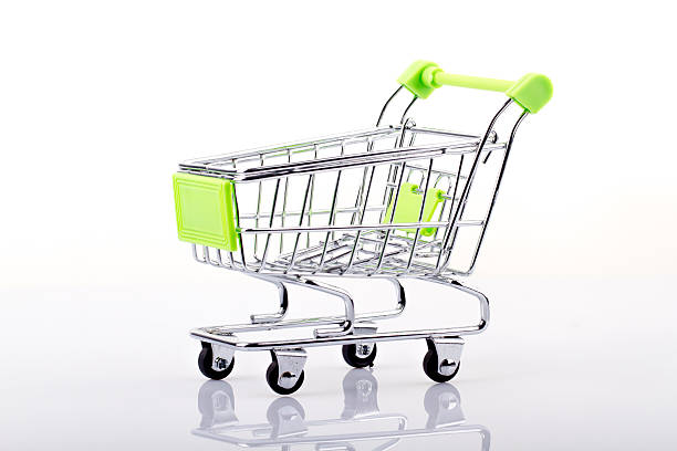 istock green Shopping Cart Isolated On White reflection 505692854