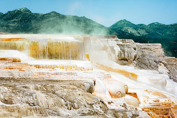 Hot sulfurous springs at Yellowstone park, cascading down the cliffs.