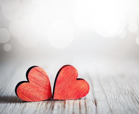 Wooden toy brick with heart cut out. This file is cleaned and retouched.