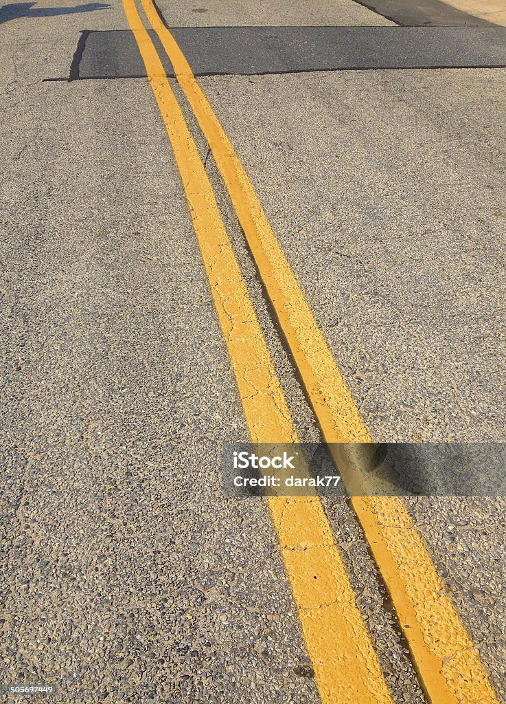 Road Dividing Lines Close-up of dividing lines on a road. Asphalt Stock Photo