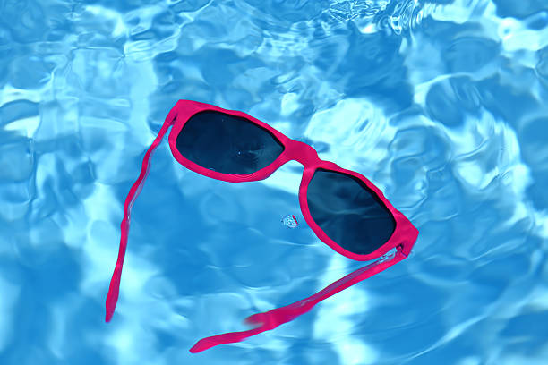 istock Sunglasses are sinking in water 505698401