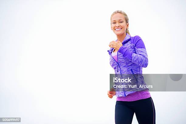 Keeping Herself In Perfect Shape Stock Photo - Download Image Now - 20-29 Years, 25-29 Years, Active Lifestyle