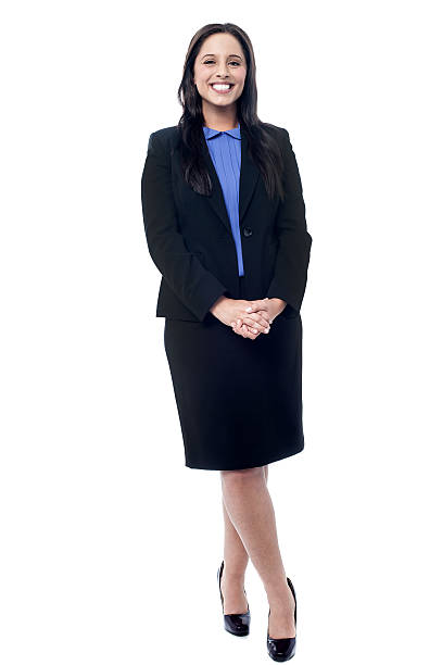 istock Smiling business woman standing 505700791