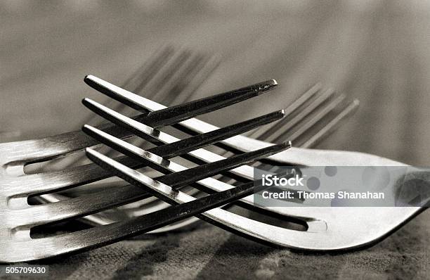 Romantic Or Possibly Angry Forks Stock Photo - Download Image Now - Abstract, Black And White, Diner