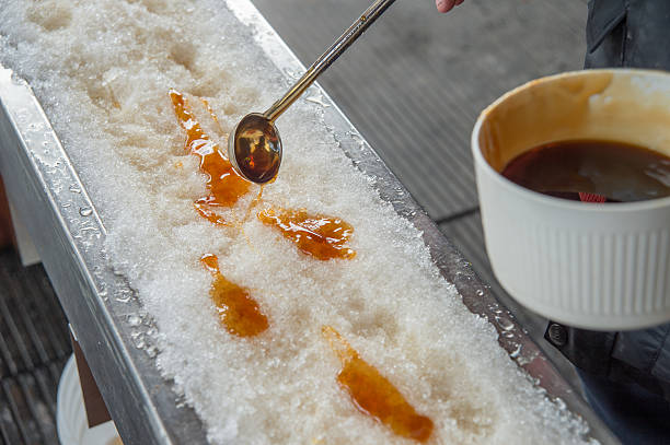 istock Maple taffy on snow during sugar shack period. 505709958