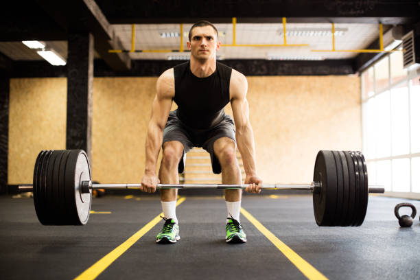 istock Man exercise at the gym 505710336