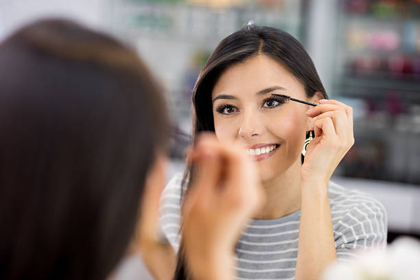 istock Woman applying mascara - makeup concepts 505713310