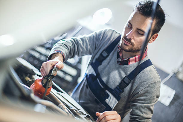istock Car mechanic repair an engine. 505713328