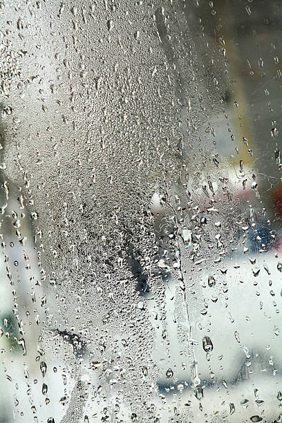 istock melted ice droplets on glass 505713674