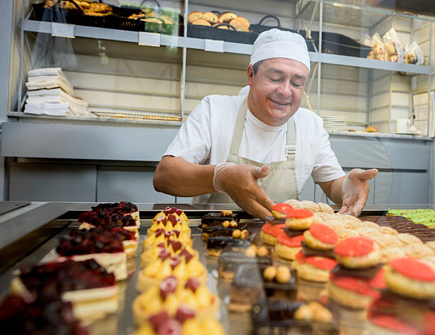Happy man baking sweet treats