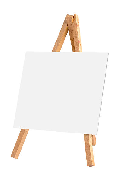 istock Easel with blank canvas isolated on white background 505714198