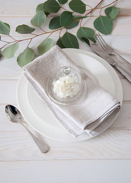 istock Elegantly served table with linen napkins and silverware 505715254