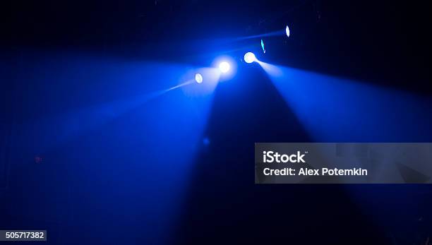 Stage Multicolored Lighting Stock Photo - Download Image Now - Spotlight, Spot Lit, Illuminated