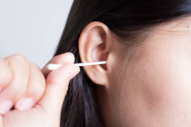 istock Woman Picking Her Ear 505719542