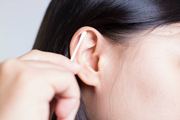 istock Woman Picking Her Ear 505719622