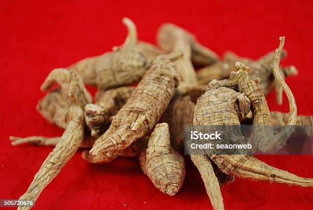 Ginseng Stack Up On A White Background Stock Photo - Download Image Now - Botany, Close-up, Cooking