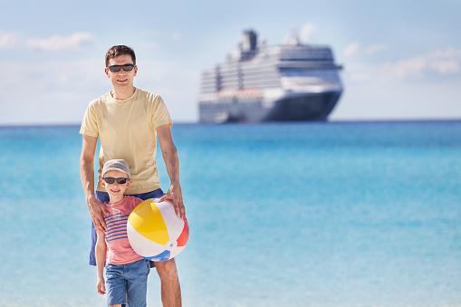 family of two enjoying summer at the beach, vacation and cruise concept