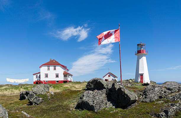 Newfoundland Canadian Pride and Lighthouse stock photo