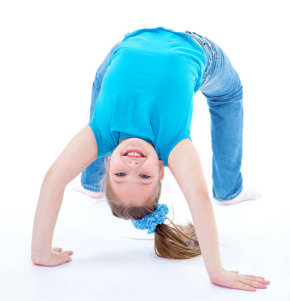 istock girl gymnast on a white background 505721551